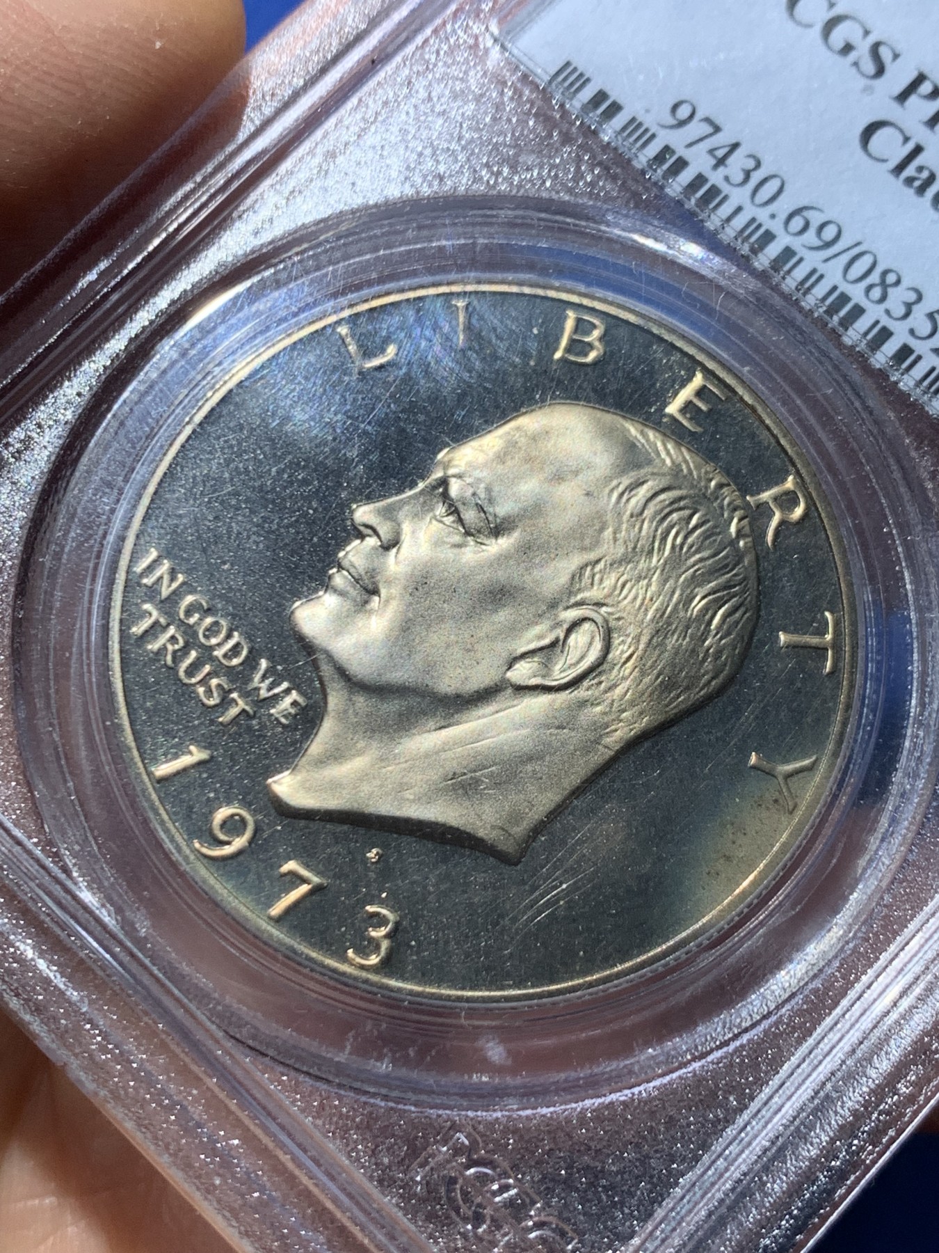 《竞宝斋》第240场-周日，周一 年终尾场 (全场包邮) PCGS-PR69DCAM 1973年美国艾森豪威尔1美元精制币，直径38mm，重22.8克，状态极佳，PC早期经典小白盒老盒无官网图，更高评级数量55枚。