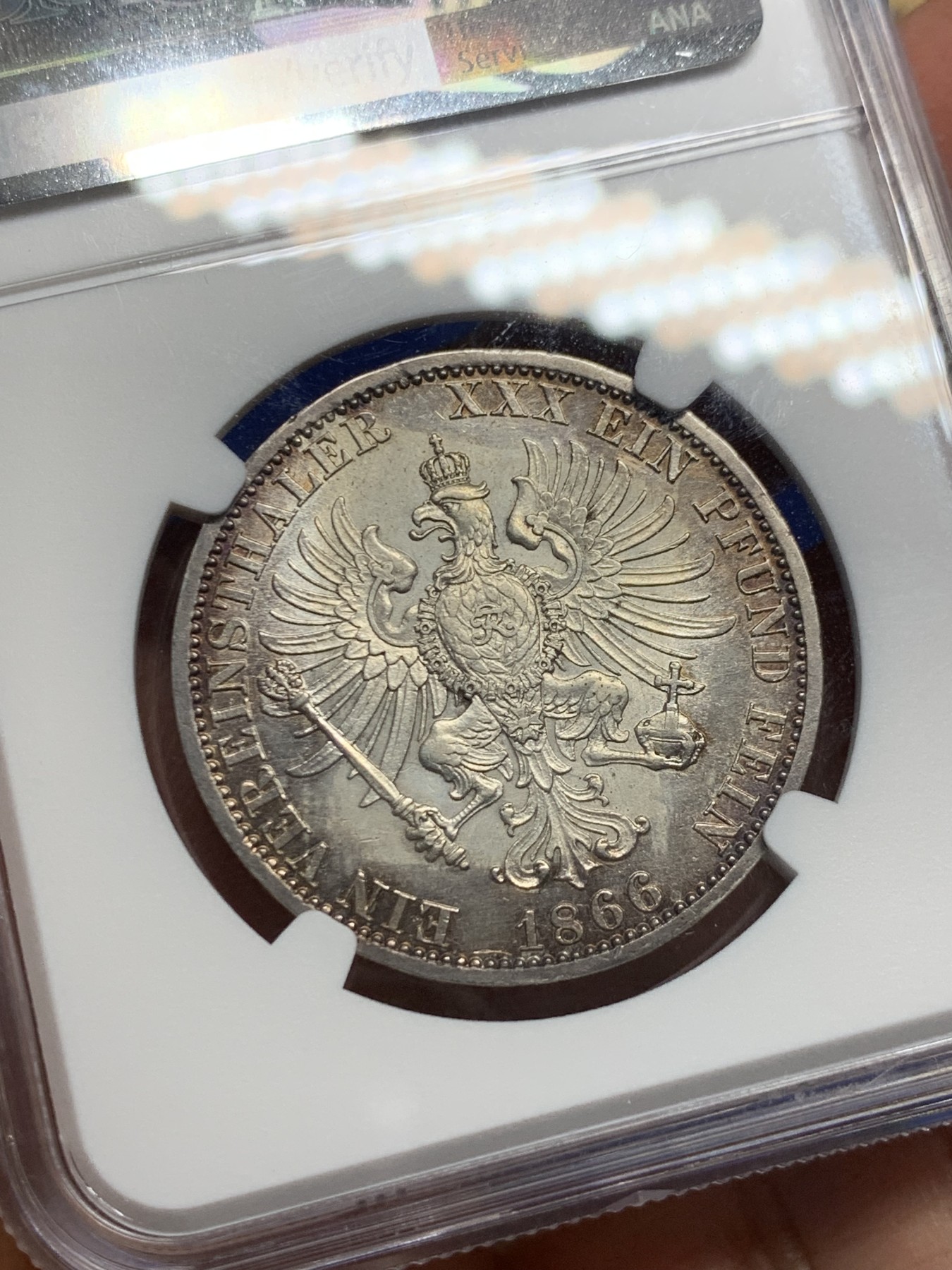 《竞宝斋》第240场-周日，周一 年终尾场 (全场包邮) NGC AUD 1866年德国普鲁士威廉一世1泰勒银币，包浆漂亮，品相很好