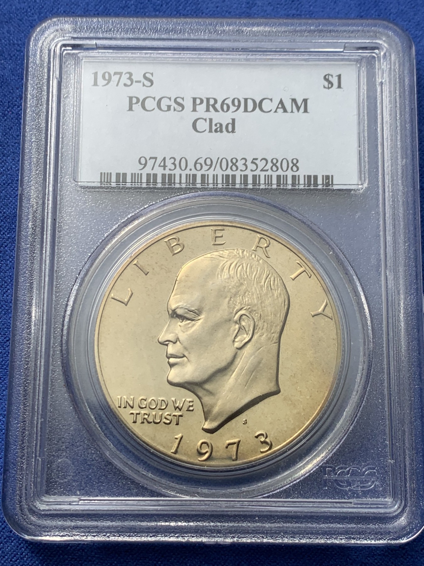 《竞宝斋》第240场-周日，周一 年终尾场 (全场包邮) PCGS-PR69DCAM 1973年美国艾森豪威尔1美元精制币，直径38mm，重22.8克，状态极佳，PC早期经典小白盒老盒无官网图，更高评级数量55枚。