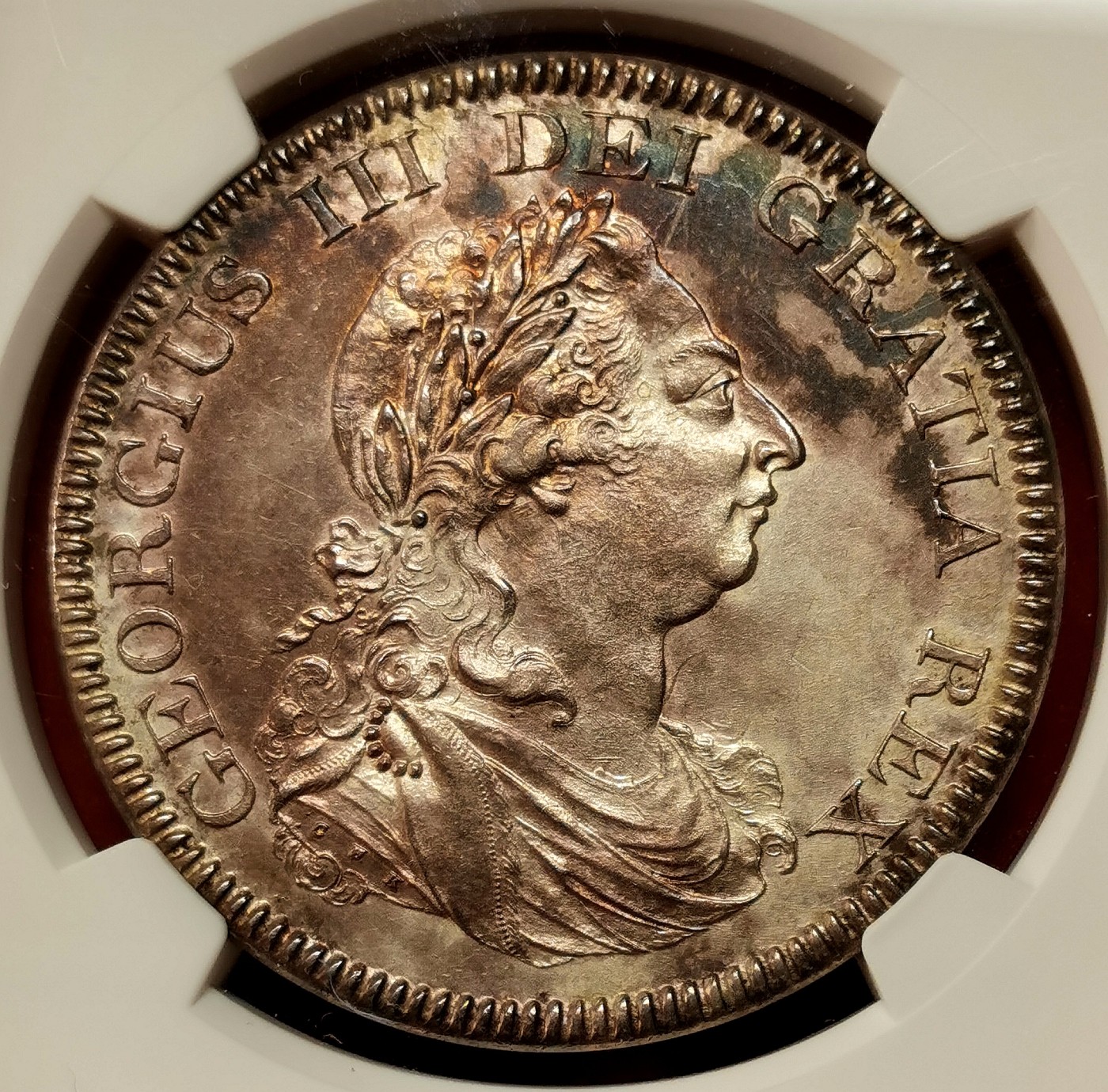 凡希社世界钱币微拍第二百六十期 荐！1804英格兰银行乔三dollars(5先令)大银NGC-MS61 复压在墨西哥双柱上，细节可说完美，双面洋红包浆更添迷人魅力，SOHO出品的具有重要铸造史和货币史价值的样本！ 