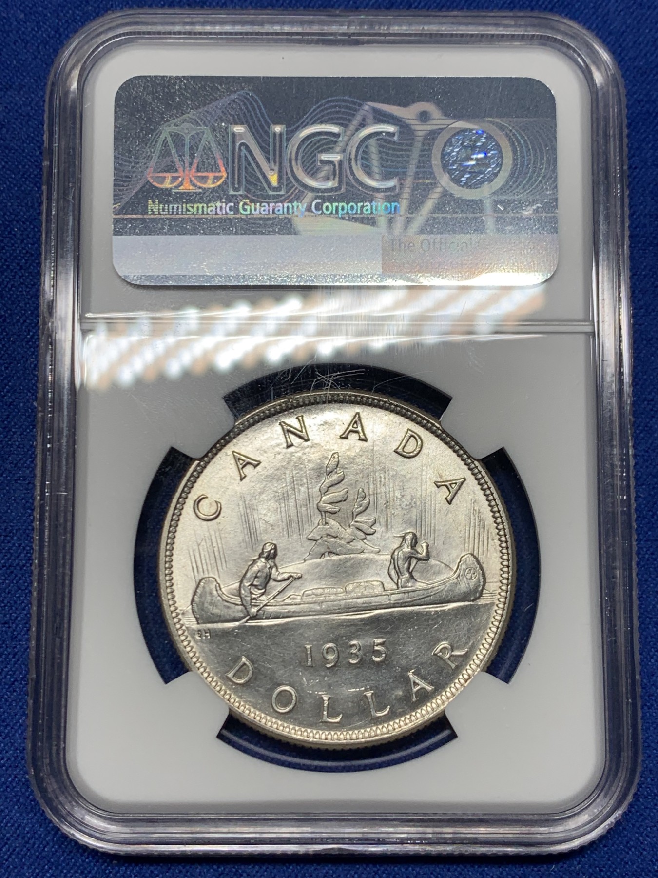 《竞宝斋》第240场-周日，周一 年终尾场 (全场包邮) NGC-MS64 加拿大 1935年1元 乔五划船银币 经典图案 银光闪闪 高分好品 一步到位