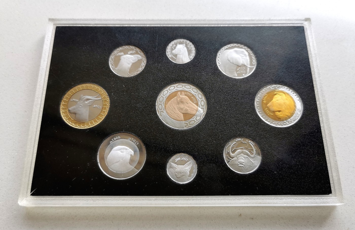 凡希社世界钱币微拍第二百六十期 荐！阿尔及利亚混年版精铸PS九枚原厂塑封附证书，现代PS最顶级稀有的品种之一！