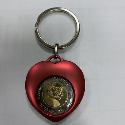 康怡轩钱币【新加坡+不丹+澳门+帕劳+美国+蒙古 纪念币专场】第251010期  2017年新加坡发行5新元双金属纪念币-红心钥匙扣