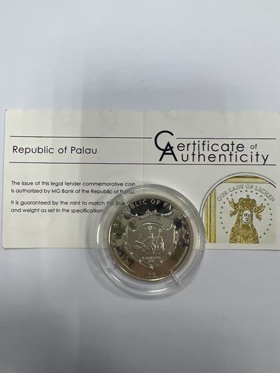 康怡轩钱币【新加坡+不丹+澳门+帕劳+美国+蒙古 纪念币专场】第251010期  2011年帕劳发行利西恩圣母2元镀金精制纪念银币（原证）