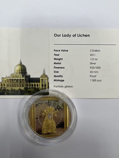 康怡轩钱币【新加坡+不丹+澳门+帕劳+美国+蒙古 纪念币专场】第251010期  2011年帕劳发行利西恩圣母2元镀金精制纪念银币（原证）