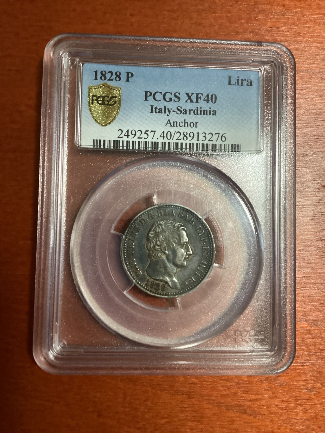 长老汇兔年精选第二场 1828 P Lira Anchor意大利萨迪那1里拉银币，PCGS XF40，唯一记录