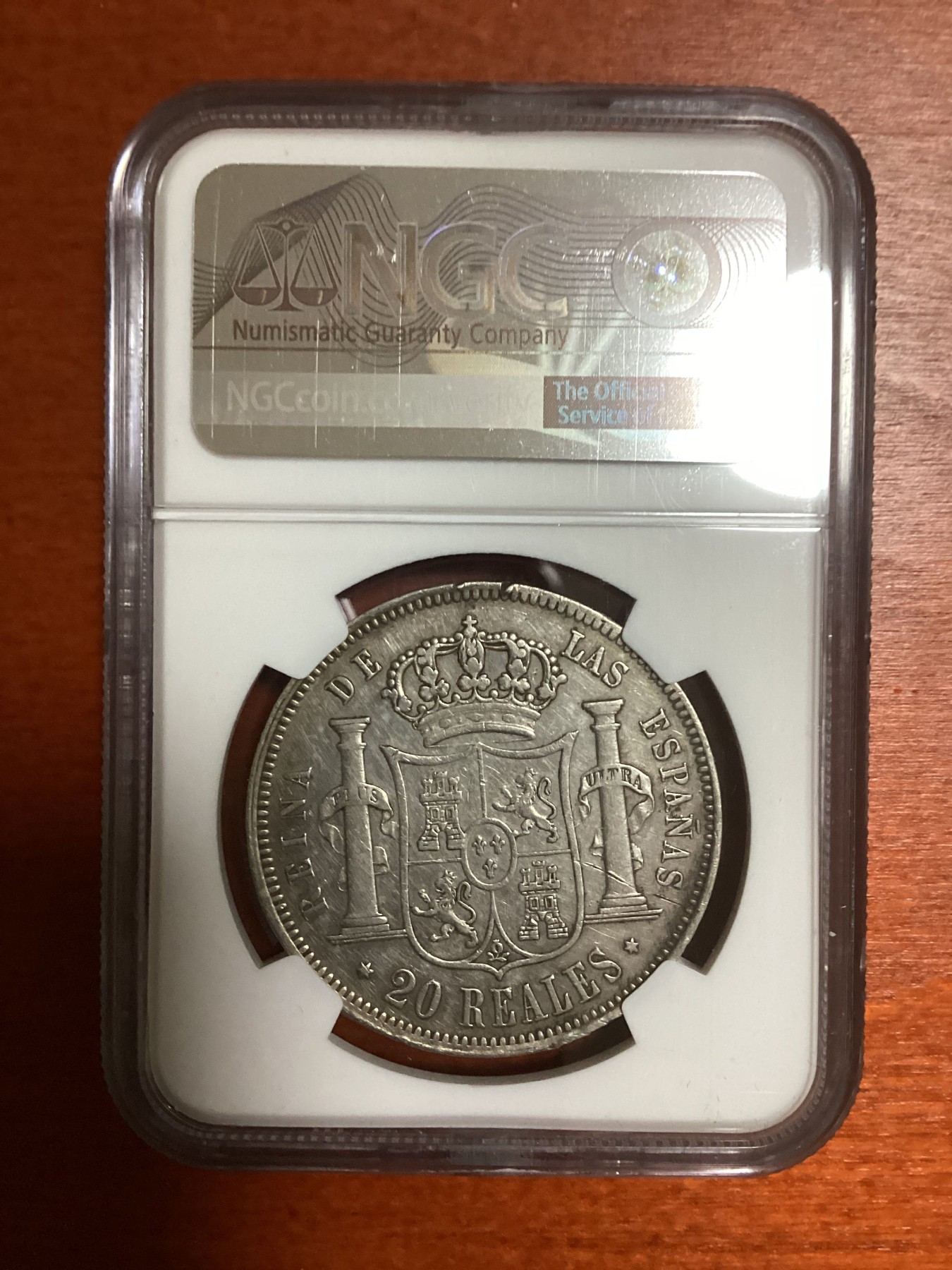 长老汇兔年精选第二场 1854 西班牙伊莎贝拉二世20里亚尔大银币，NGC AUD，马德里造币厂出品
