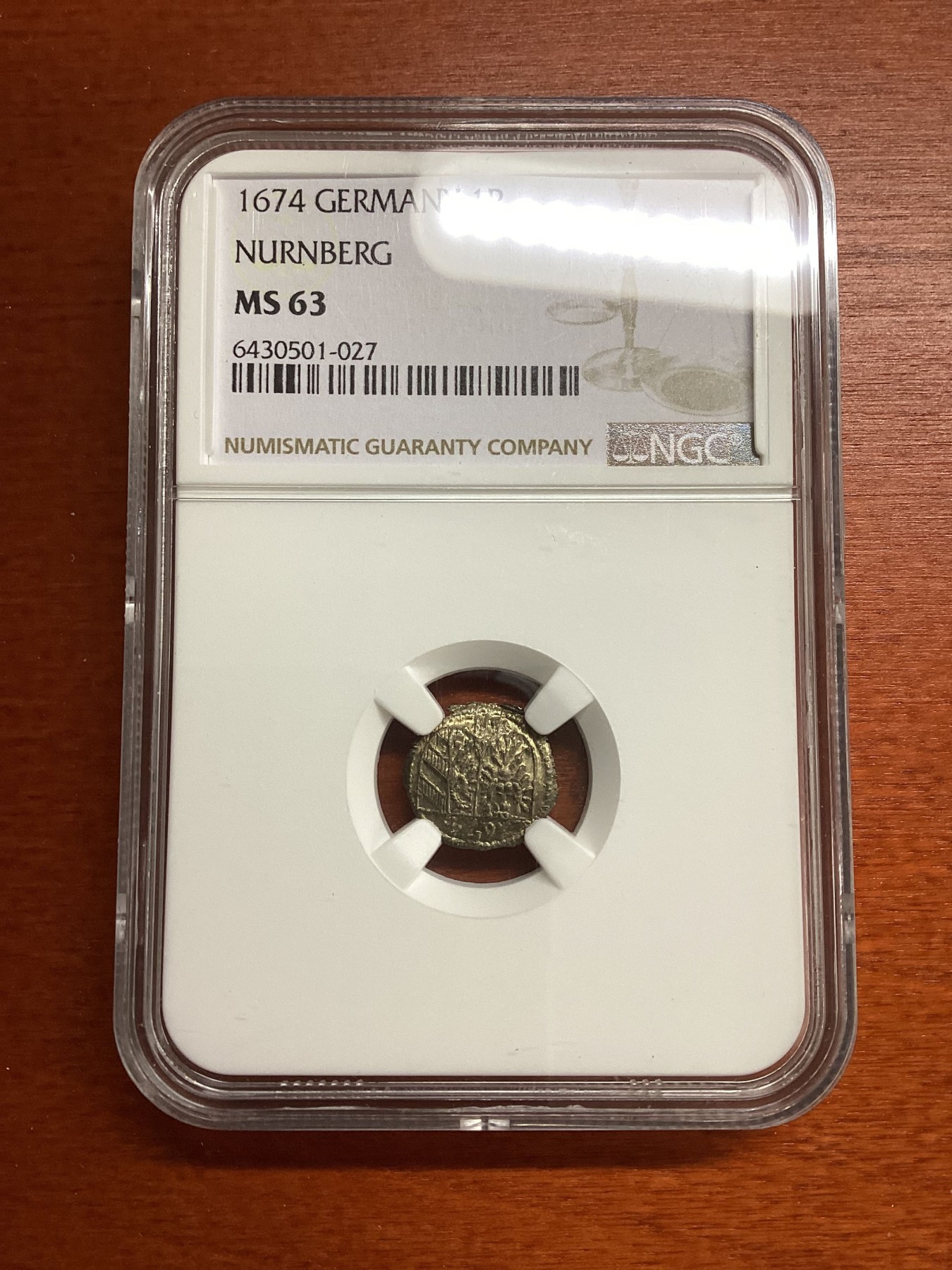 长老汇兔年精选第二场 1674 GERMANY NURNBERG德国纽伦堡1芬尼单面银币，NGC MS63分，唯二冠军分，末年版，克书XF40分标价100美金