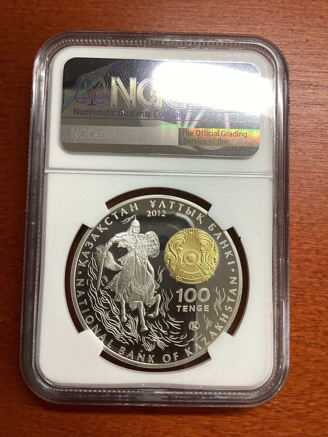 长老汇兔年精选第二场 2012 哈萨克斯坦背吧而死苏丹100坚戈镀金精制银币，NGC PF69UC，更高分仅有7枚