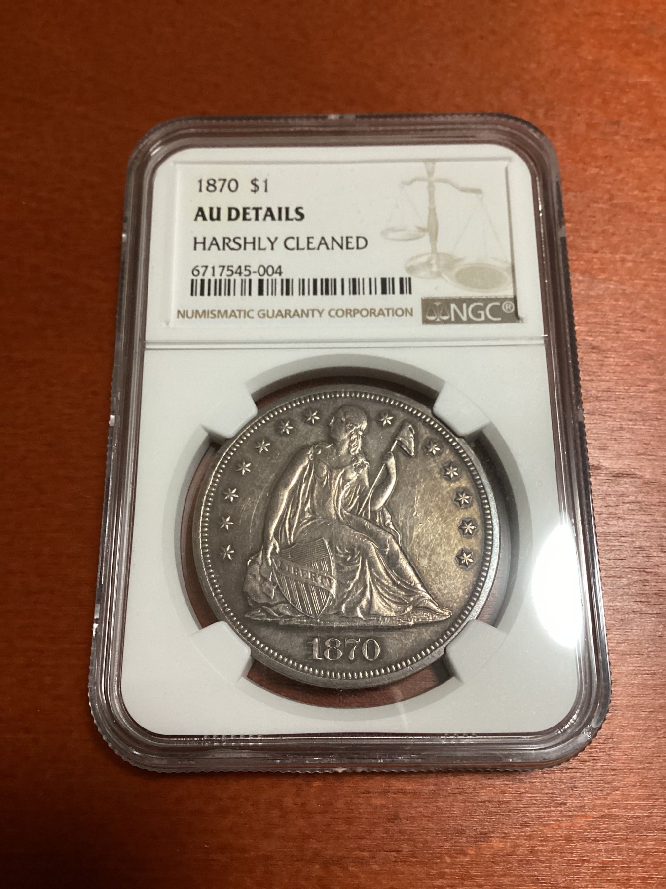 长老汇兔年精选第二场 1870美国坐姿女神一美元银币，NGC AUD，控分很严，出分就赚了，其实品相很好