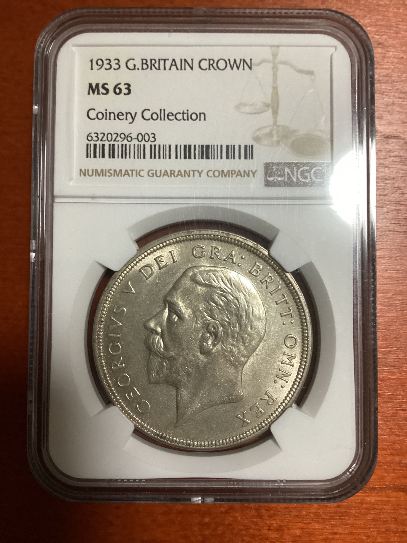 长老汇兔年精选第二场 1933英国乔治五世花冠1克朗大银币，NGC MS63分，名人旧藏