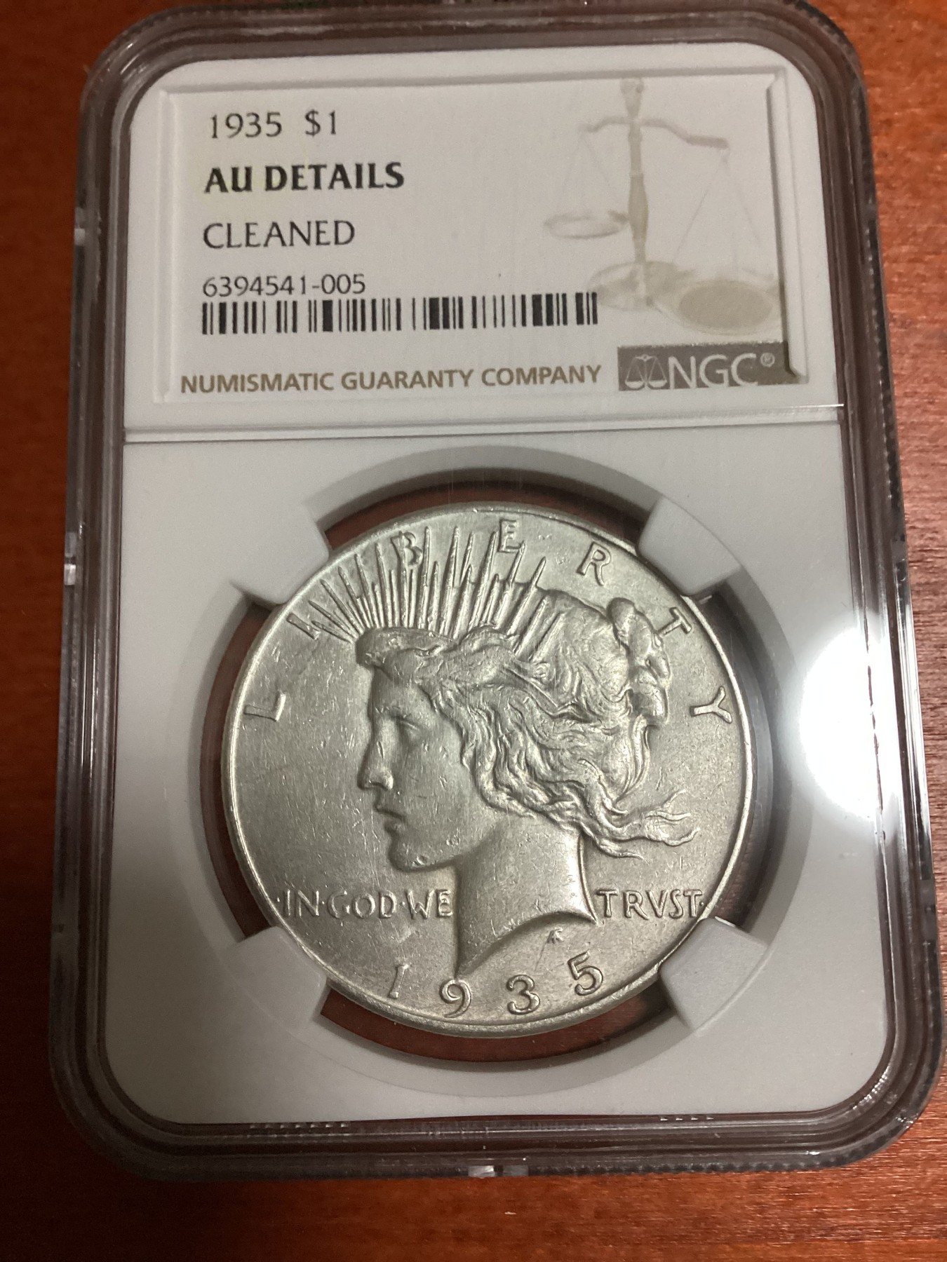 长老汇兔年精选第二场 1935美国和平1美元银币，NGC AUC，特年