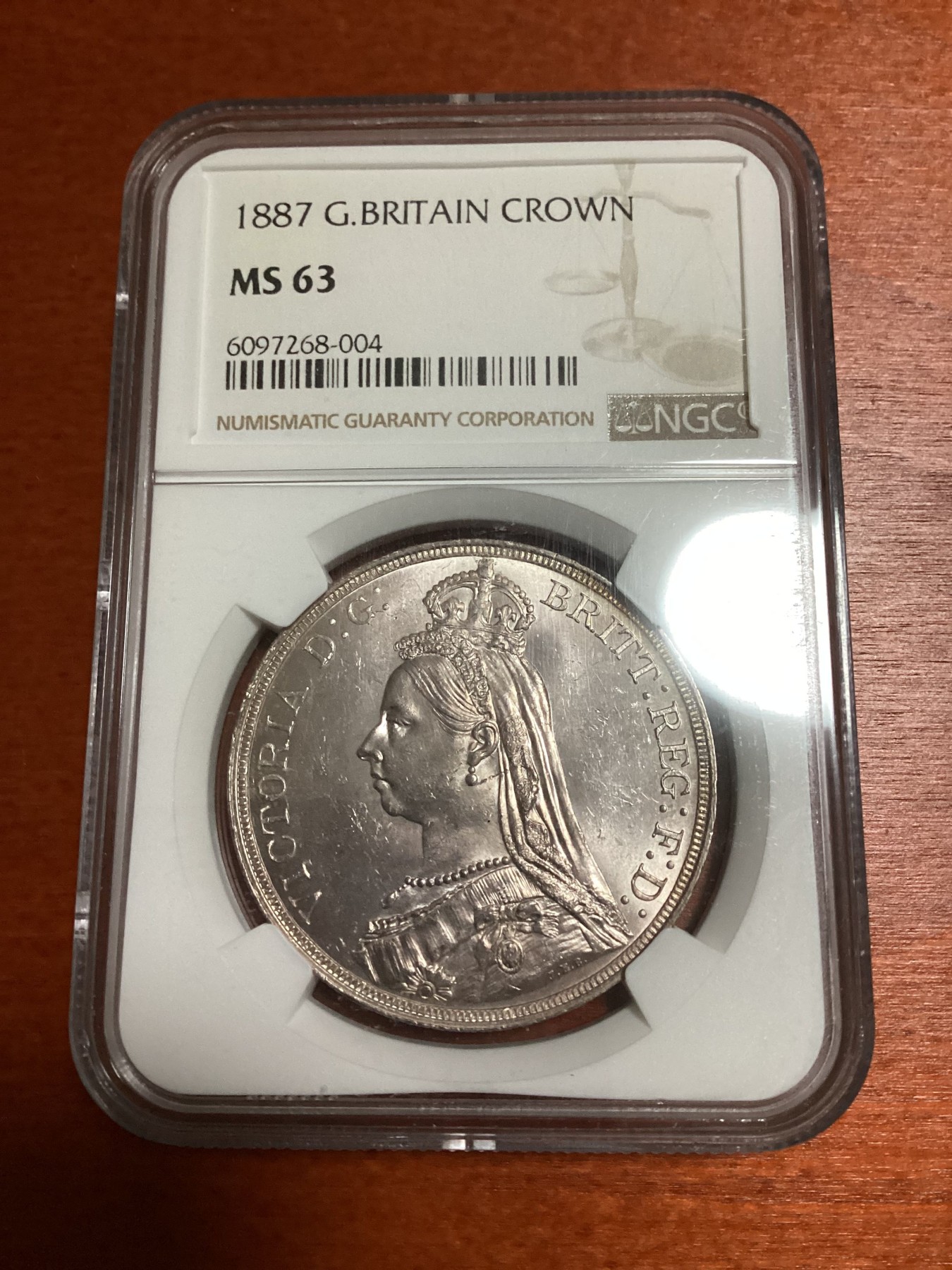 长老汇兔年精选第二场 1887 英国维多利亚高冠马剑1克朗大银币，NGC MS63分