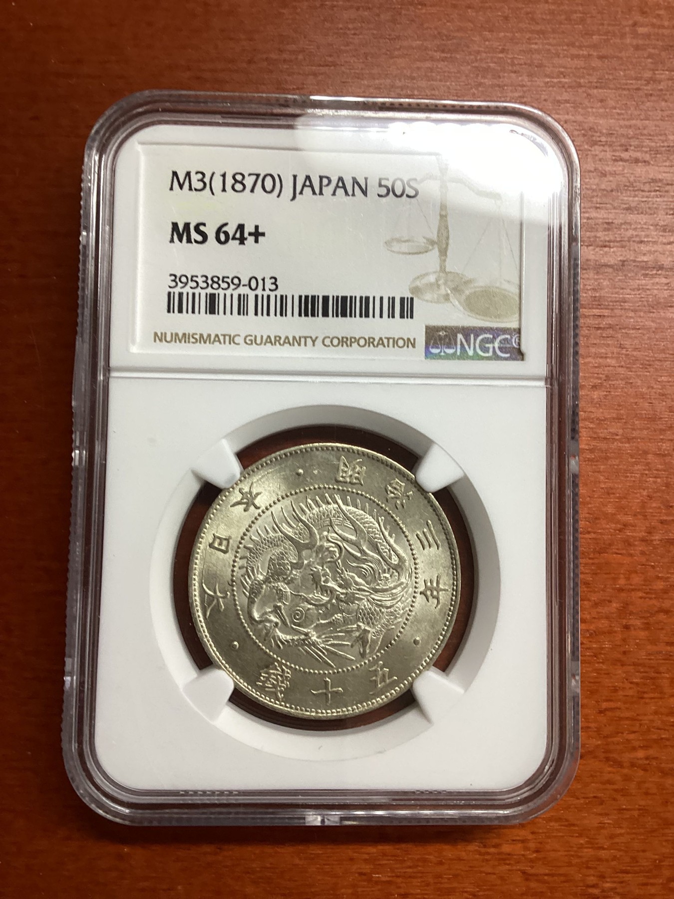 长老汇兔年精选第二场 M3(1870) 日本明治三年龙洋50钱银币，NGC MS64+，明治首年版