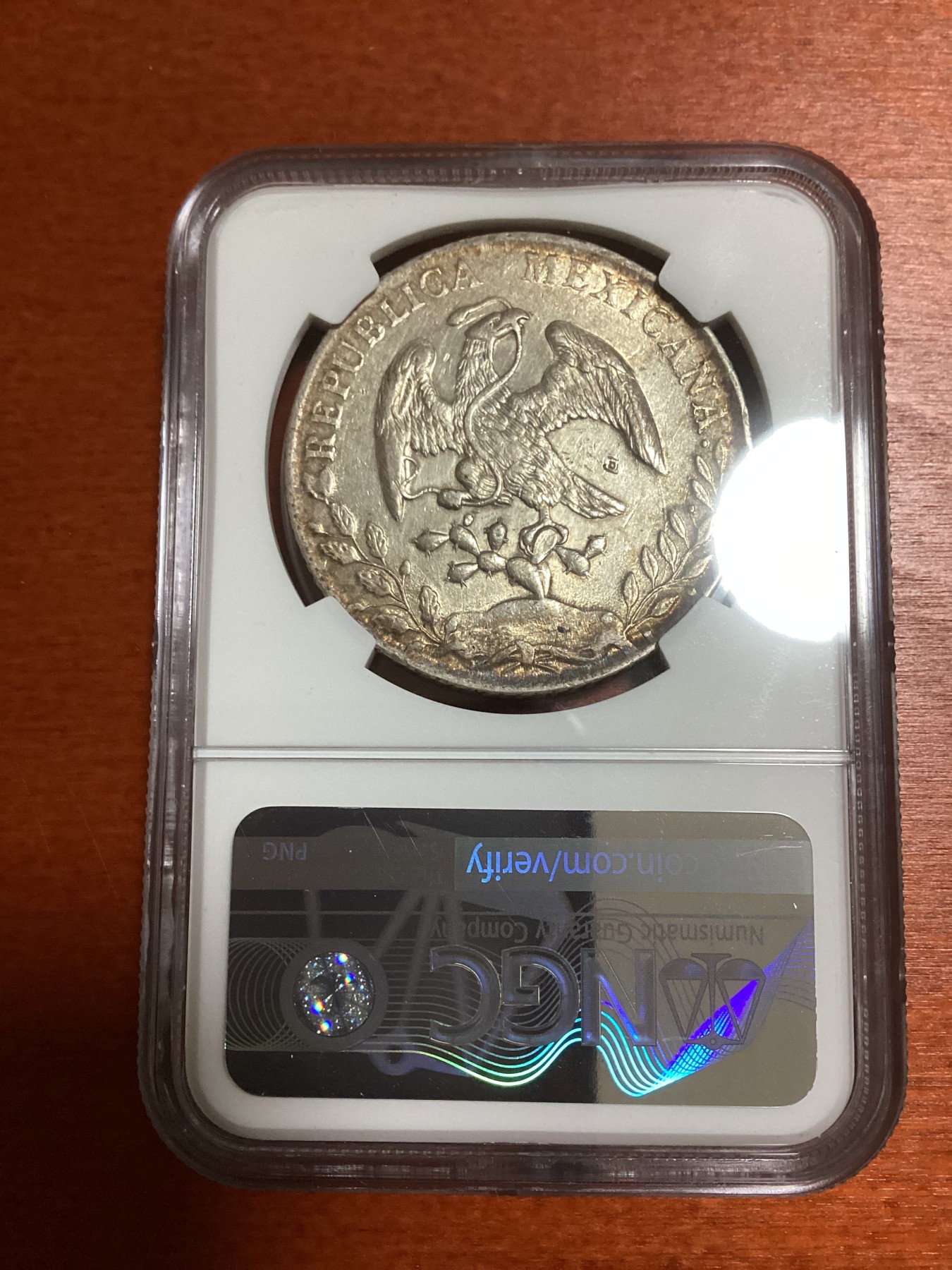 长老汇兔年精选第二场 1888PI MR 墨西哥鹰洋8R银币，NGC UNC， 中间有个戳记，否则状态超过许多65分