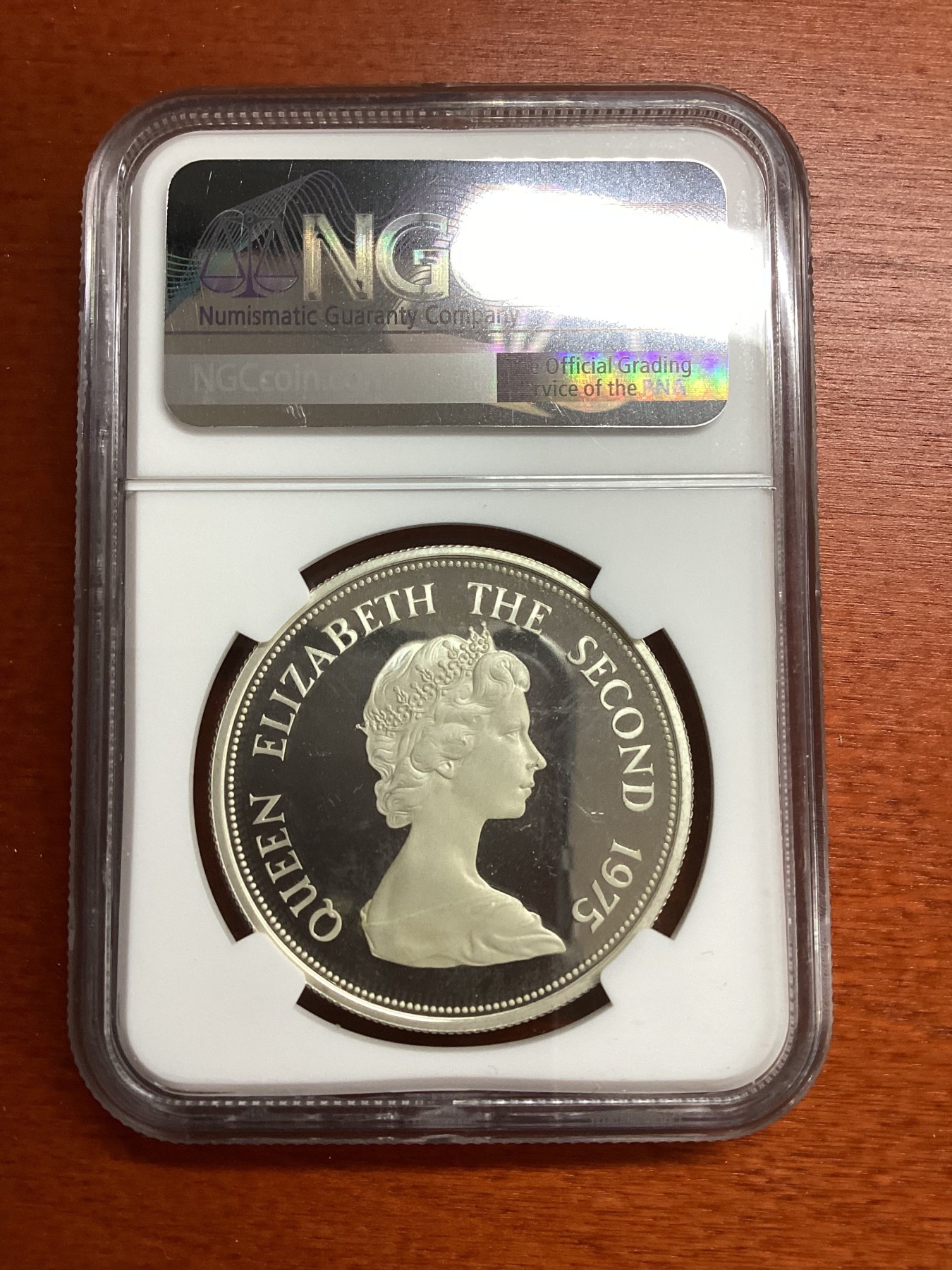 长老汇兔年精选第二场 1975 毛里求斯蓝色燕尾蝶25卢比精制银币，NGC PF63UC，渡渡鸟带火了毛里求斯