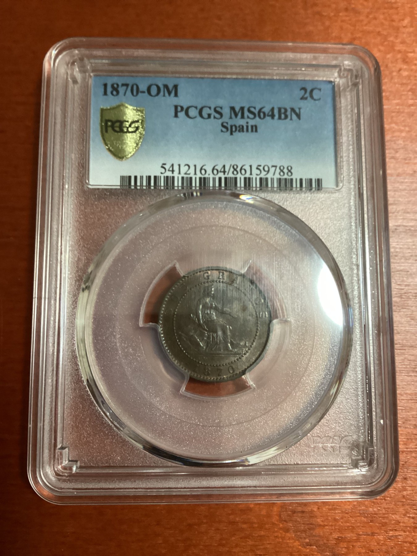 长老汇兔年精选第二场 1870-OM 西班牙地方省2分铜币，PCGS MS64BN，亚军分，更高分仅有1枚
