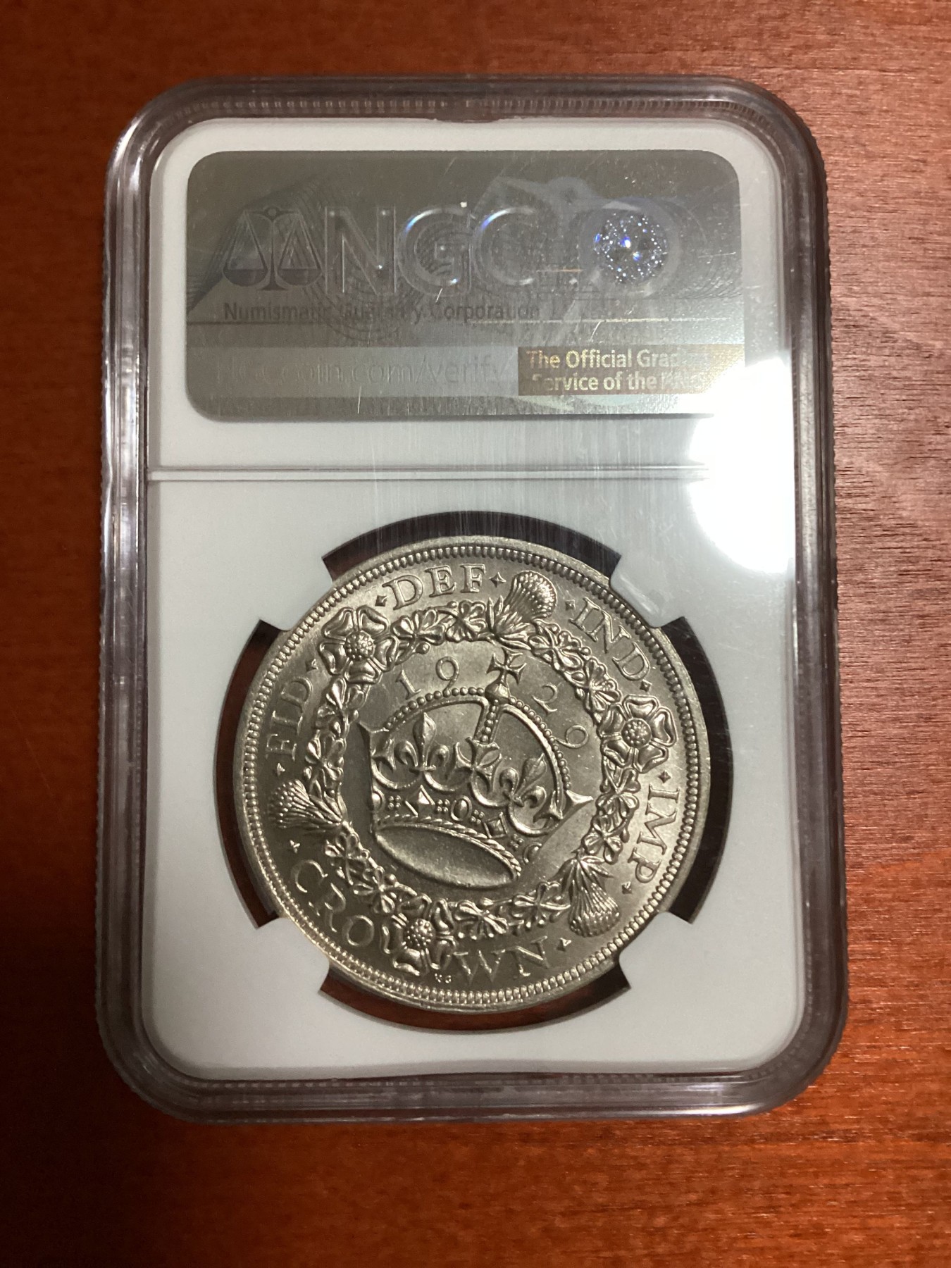 长老汇兔年精选第二场 1929 英国乔治五世花冠1克朗大银币，NGC MS63分，更高分仅有7枚，克书报价900美金，仅有4000多枚