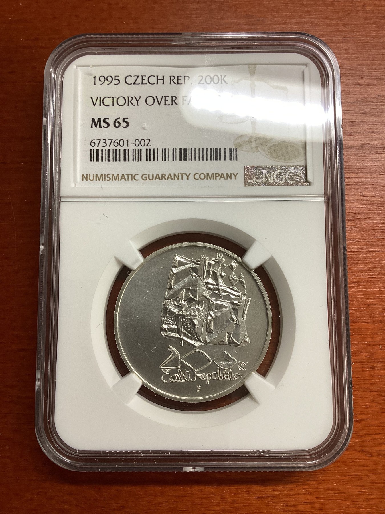 长老汇兔年精选第二场 1995 捷克战胜法西斯200克朗银币，NGC MS65分，唯一冠军分，1997年5830枚销毁，少见，冠军分外网基本2000元往上