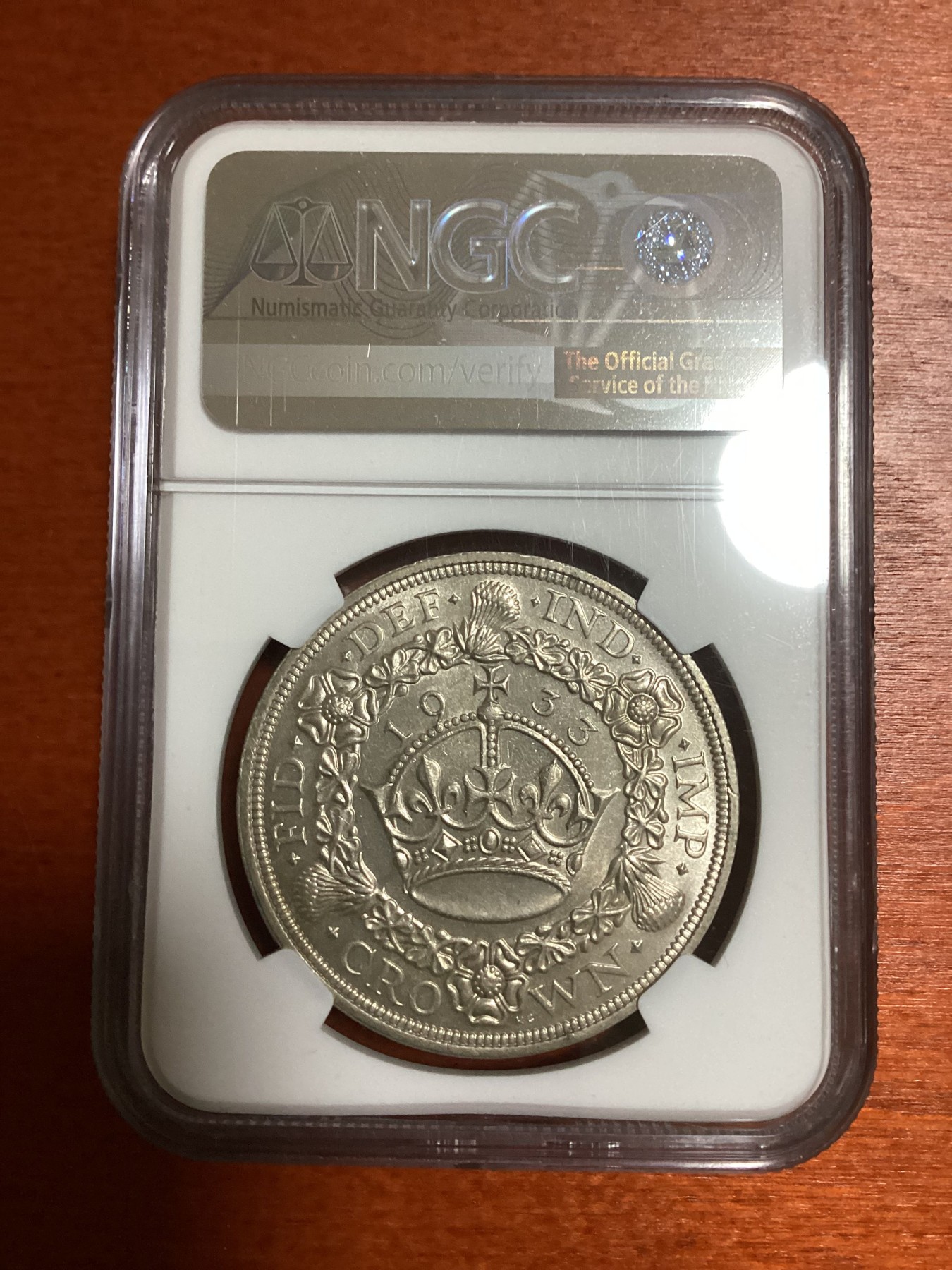 长老汇兔年精选第二场 1933英国乔治五世花冠1克朗大银币，NGC MS63分，名人旧藏