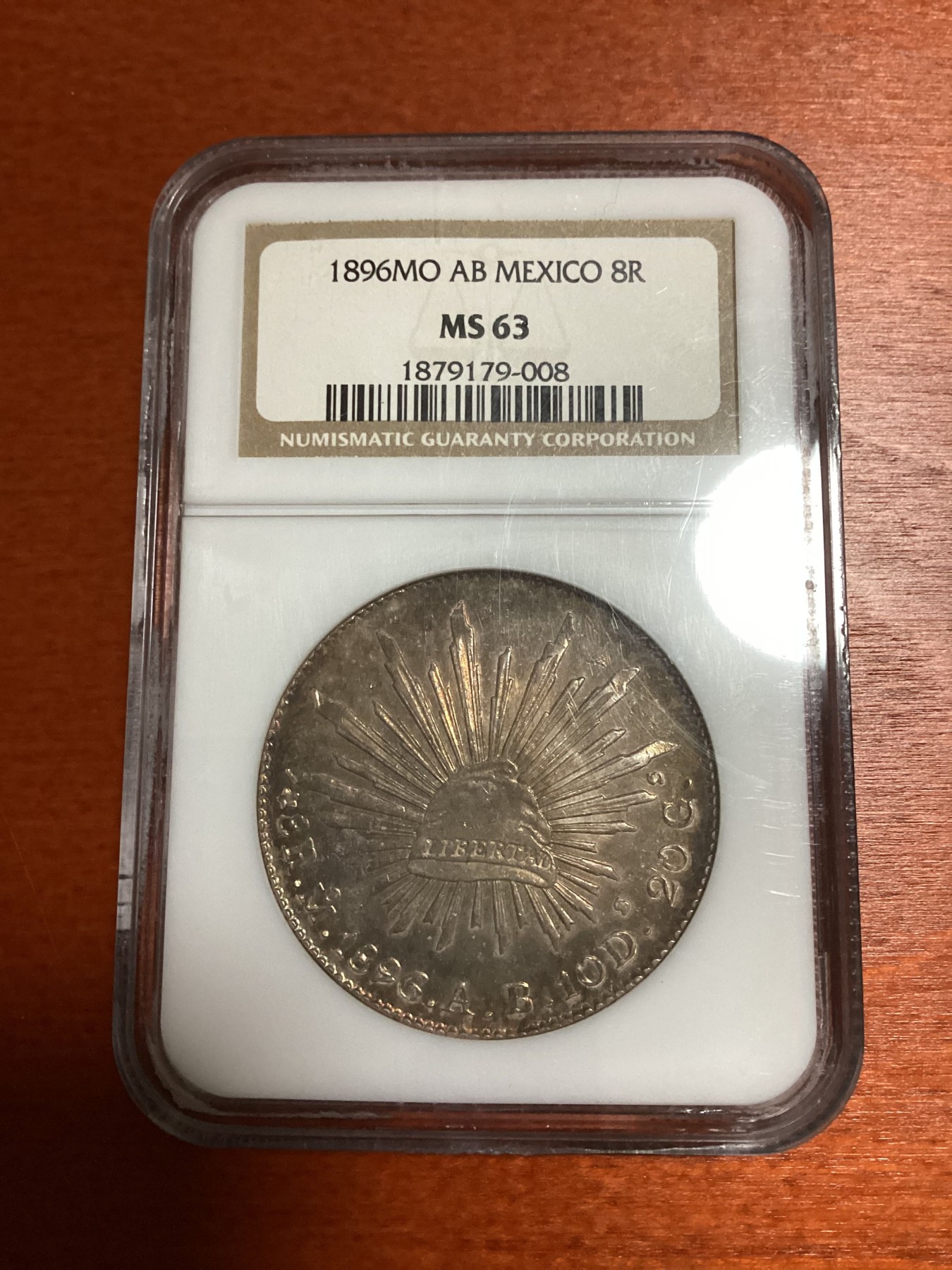 长老汇兔年精选第二场 1896MO AB 墨西哥鹰洋8R花边银币，NGC MS63分，老盒