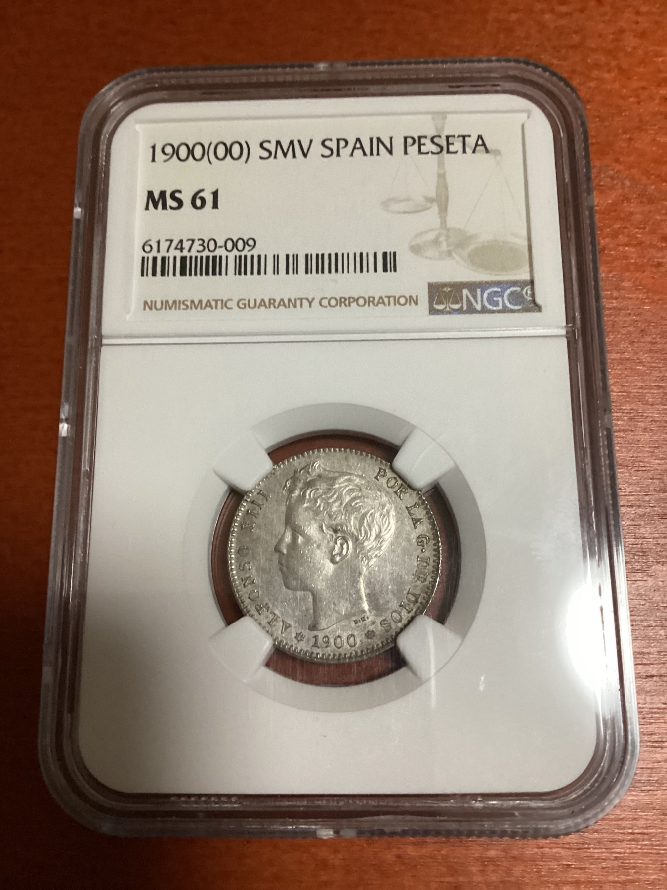 长老汇兔年精选第二场 1900(00) SMV 西班牙阿方索十三世1比塞塔银币，NGC MS61分，更高分仅有26枚，这个有分数的比8里亚尔大银币少多了