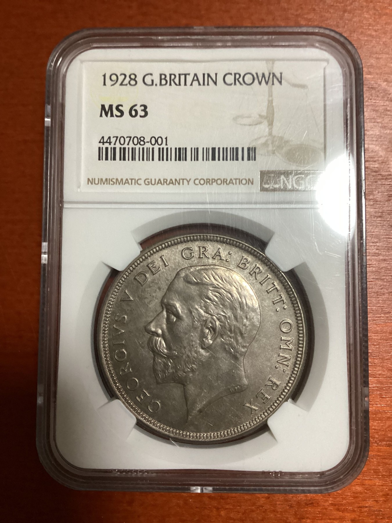 长老汇兔年精选第二场 1928 英国乔治五世花冠1克朗大银币，NGC MS63分