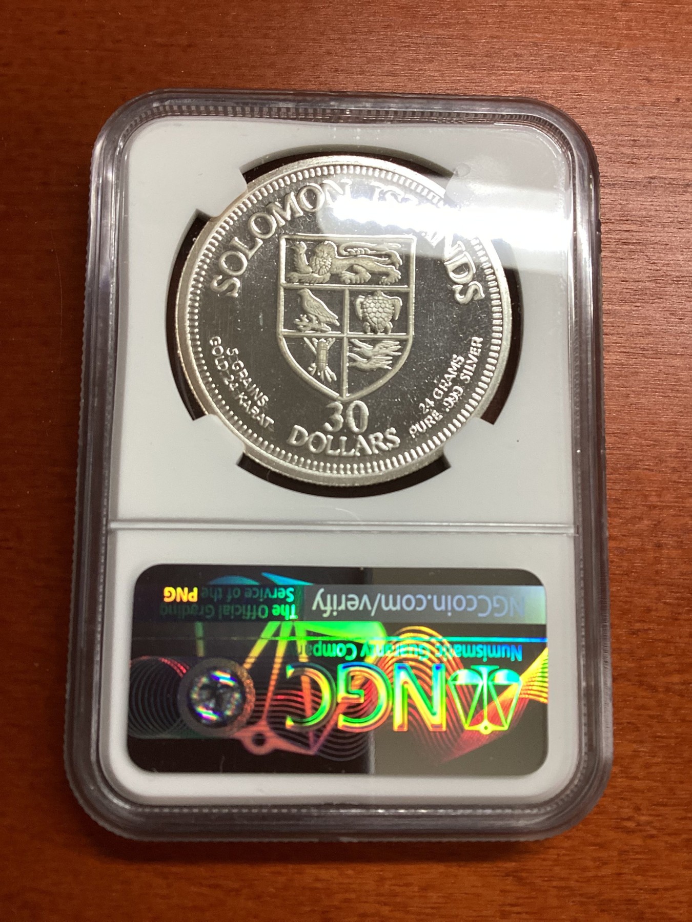 长老汇兔年精选第二场 珍稀币，1975 所罗门袋猴30元镀金精制银币，NGC PF66UC，更高分仅有9枚，背面5grains纯金