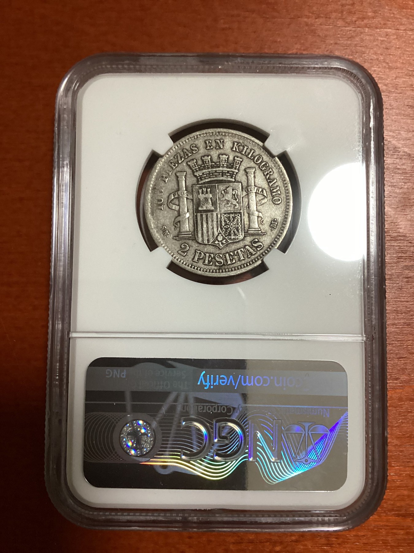 长老汇兔年精选第二场 1870(70) SNM 西班牙拿花2比塞塔银币，NGC XF45分，第四名，更高分仅有三枚