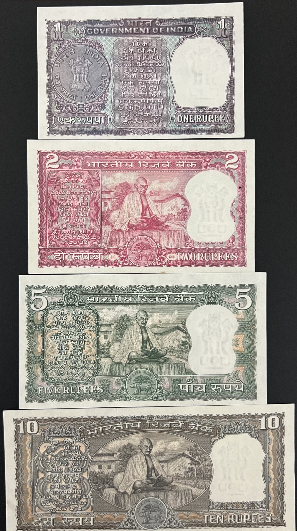 🌗乐淘淘世界纸币收藏拍卖 第41期 裸钞较多🌓 印度1969年纸币四张 1/2/5/10卢比 甘地诞辰纪念钞 有针孔 2卢比下边缘有一处黄斑 其余全新UNC
