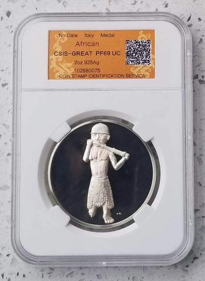 【币将精彩】世界钱币拍卖（2025-8-27） - 意大利古代著名雕塑吹笛子的非洲人纪念银章  925银2盎司，直径50毫米，信泰评级封装。