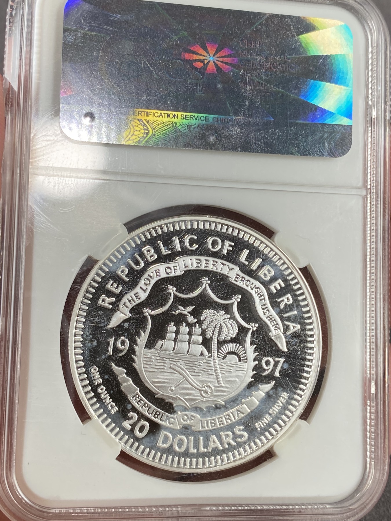 万国钱币拍卖第021期（龙年首拍） CNCS PF69 1997利比利亚20元银币