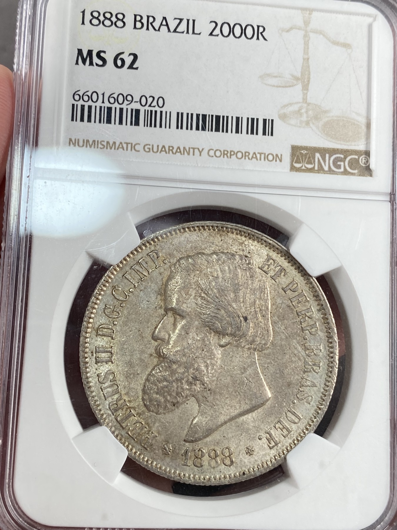 万国钱币拍卖第021期（龙年首拍） NGC MS62 1888年巴西佩德罗二世2000瑞斯流通大银币 此君在1888年废除了农奴制度 解放了100万奴隶