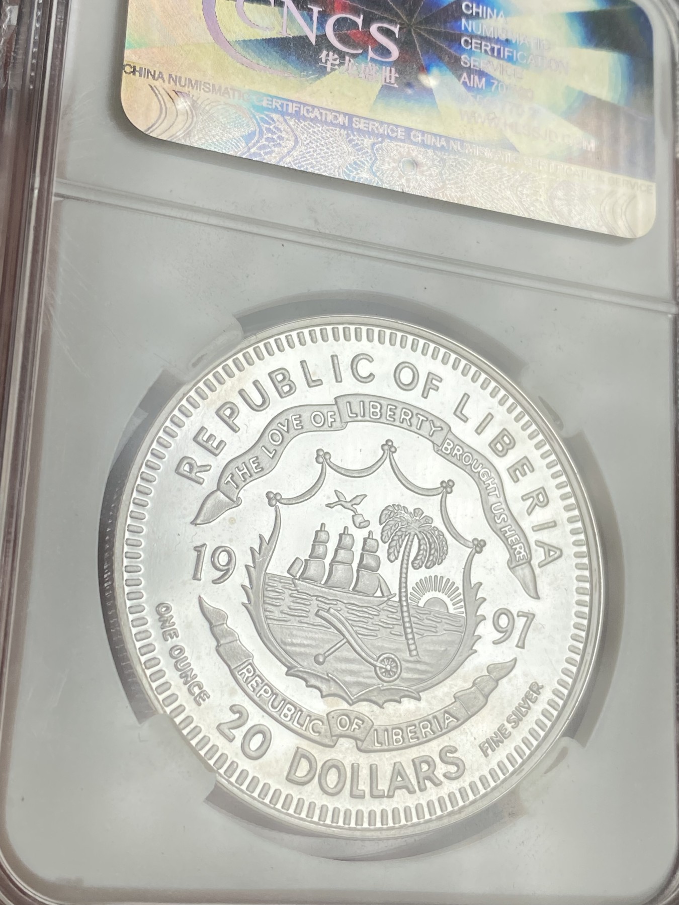 万国钱币拍卖第021期（龙年首拍） CNCS PF69 1997利比利亚20元银币