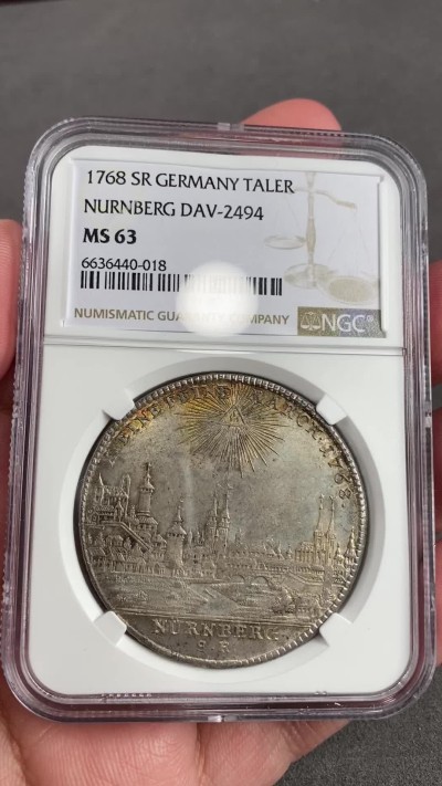 万国钱币拍卖第021期（龙年首拍） NGC MS63 1768年德国纽伦堡城市景观大泰勒 此枚无论是细节高点还是底板都近乎于完美 金色包浆让人欲罢不能 日本AW同分成交已过4万。