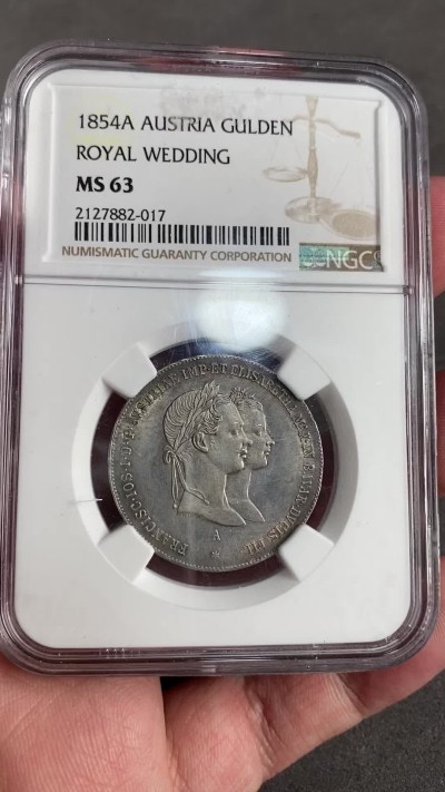 万国钱币拍卖第021期（龙年首拍） NGC MS63 1854年奥地利佛朗茨一世与茜茜公主成婚纪念1古尔登 名誉品种全深打 淡彩包浆一步到位的收藏品质