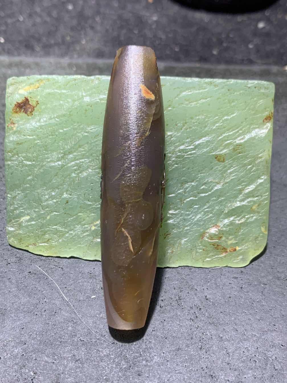 精美亚光高玉化巴西玛瑙手工俏色巧雕无相佛桶珠一个