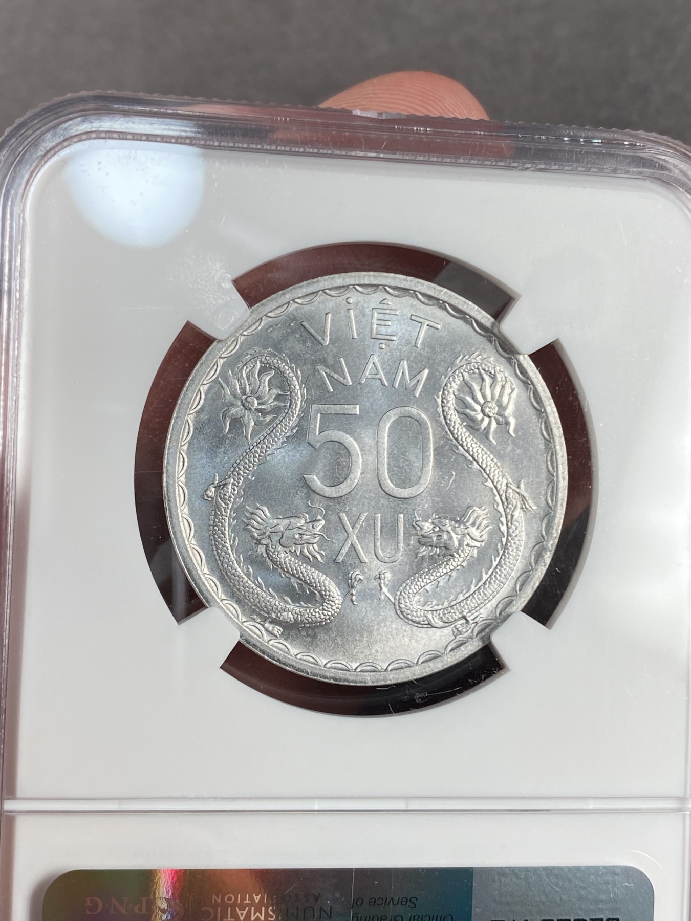 万国钱币拍卖第021期（龙年首拍） NGC MS65 1953年越南三妇女50XU 状态令人咂舌