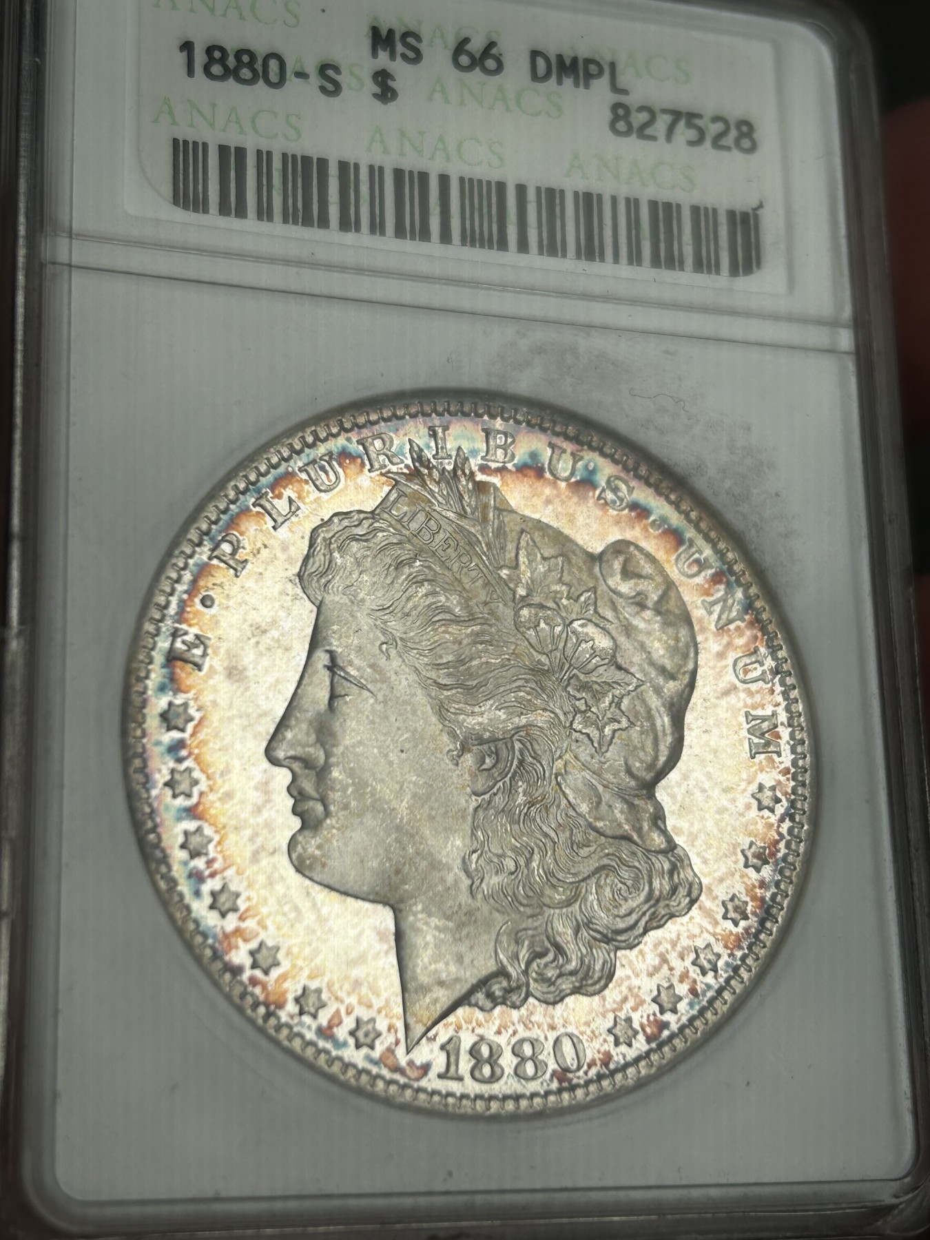 万国钱币拍卖第021期（龙年首拍） ANACS MS66DMPL 1880年美国摩根女神银元1美元 极致环彩+深度镜面 ANACS老盒难得