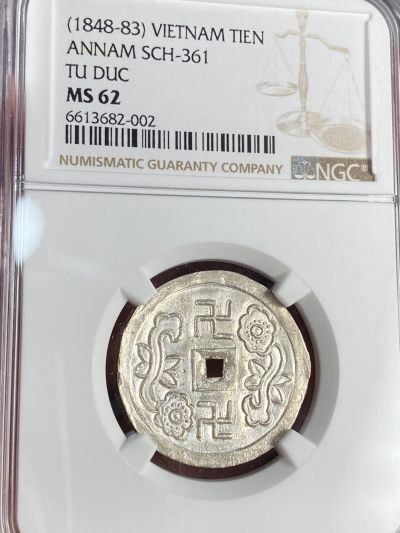 万国钱币拍卖第021期（龙年首拍） - NGC MS62 1848-83年越南安南嗣德通宝1T双如意 银霜寒光 迷人的品质和高分