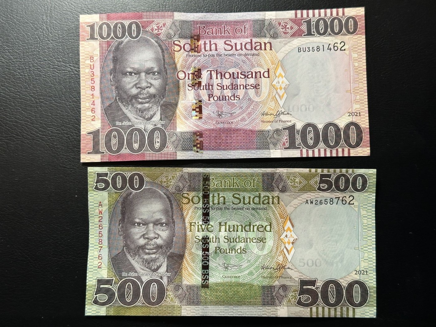 第三十六场！（本期有pmg记录仅两枚的顶级高货） 南苏丹最大面值一组两张！品相unc，尾2同62，与上一份连号！