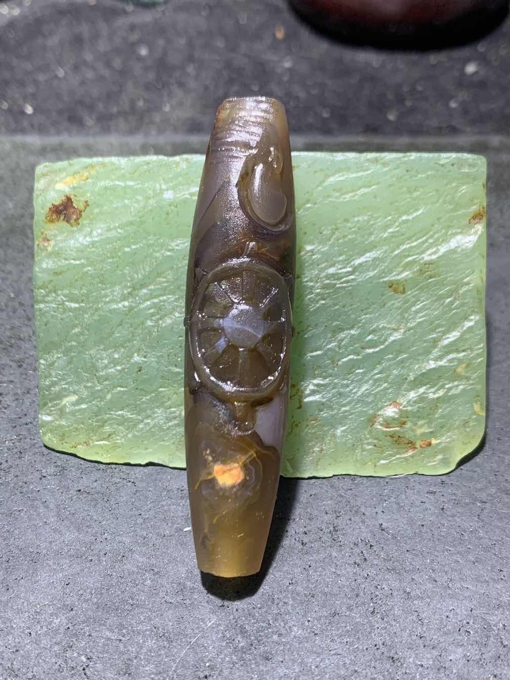 精美亚光高玉化巴西玛瑙手工俏色巧雕无相佛桶珠一个