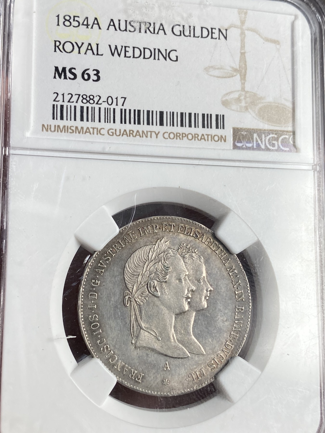 万国钱币拍卖第021期（龙年首拍） NGC MS63 1854年奥地利佛朗茨一世与茜茜公主成婚纪念1古尔登 名誉品种全深打 淡彩包浆一步到位的收藏品质