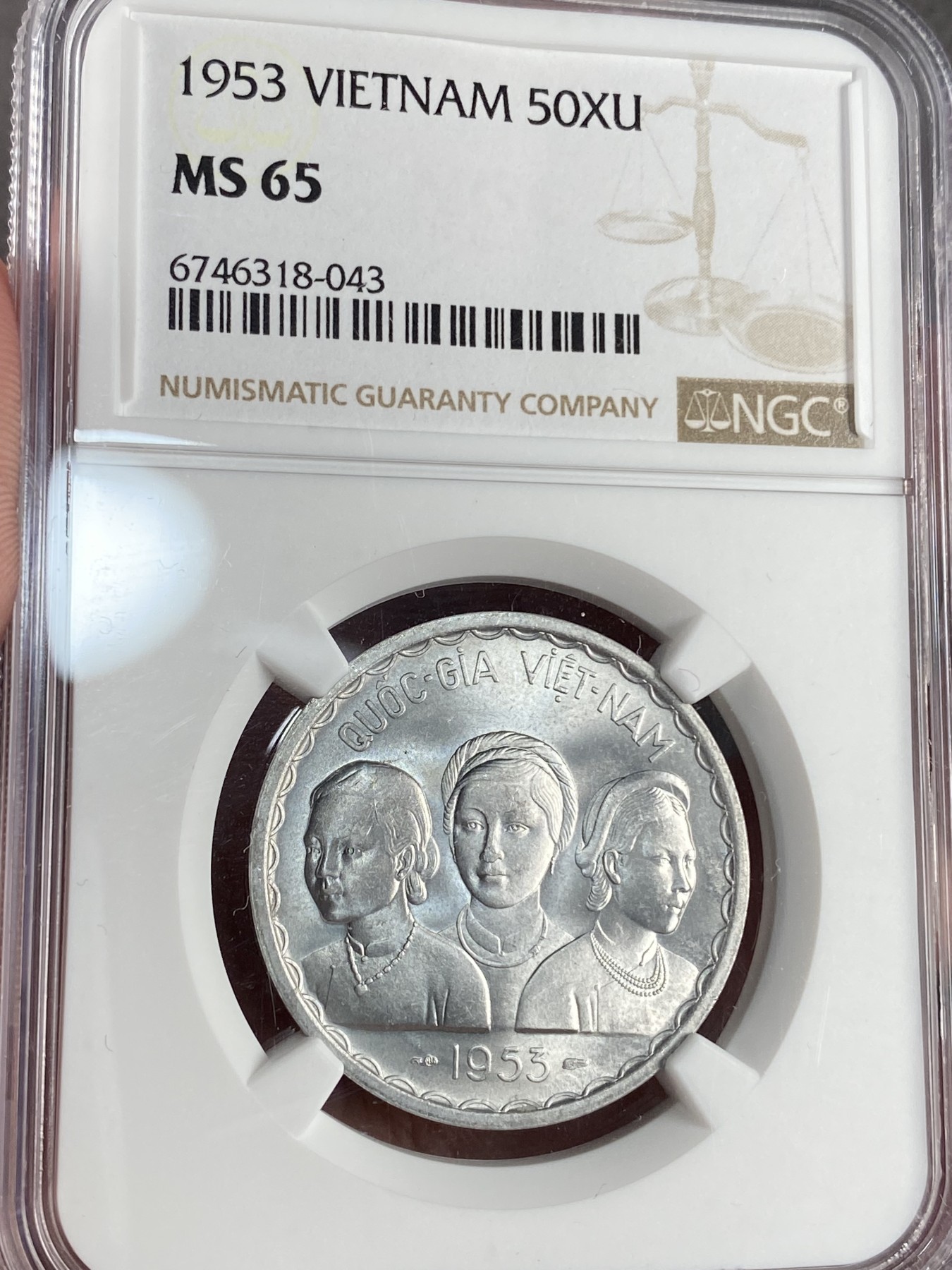 万国钱币拍卖第021期（龙年首拍） NGC MS65 1953年越南三妇女50XU 状态令人咂舌