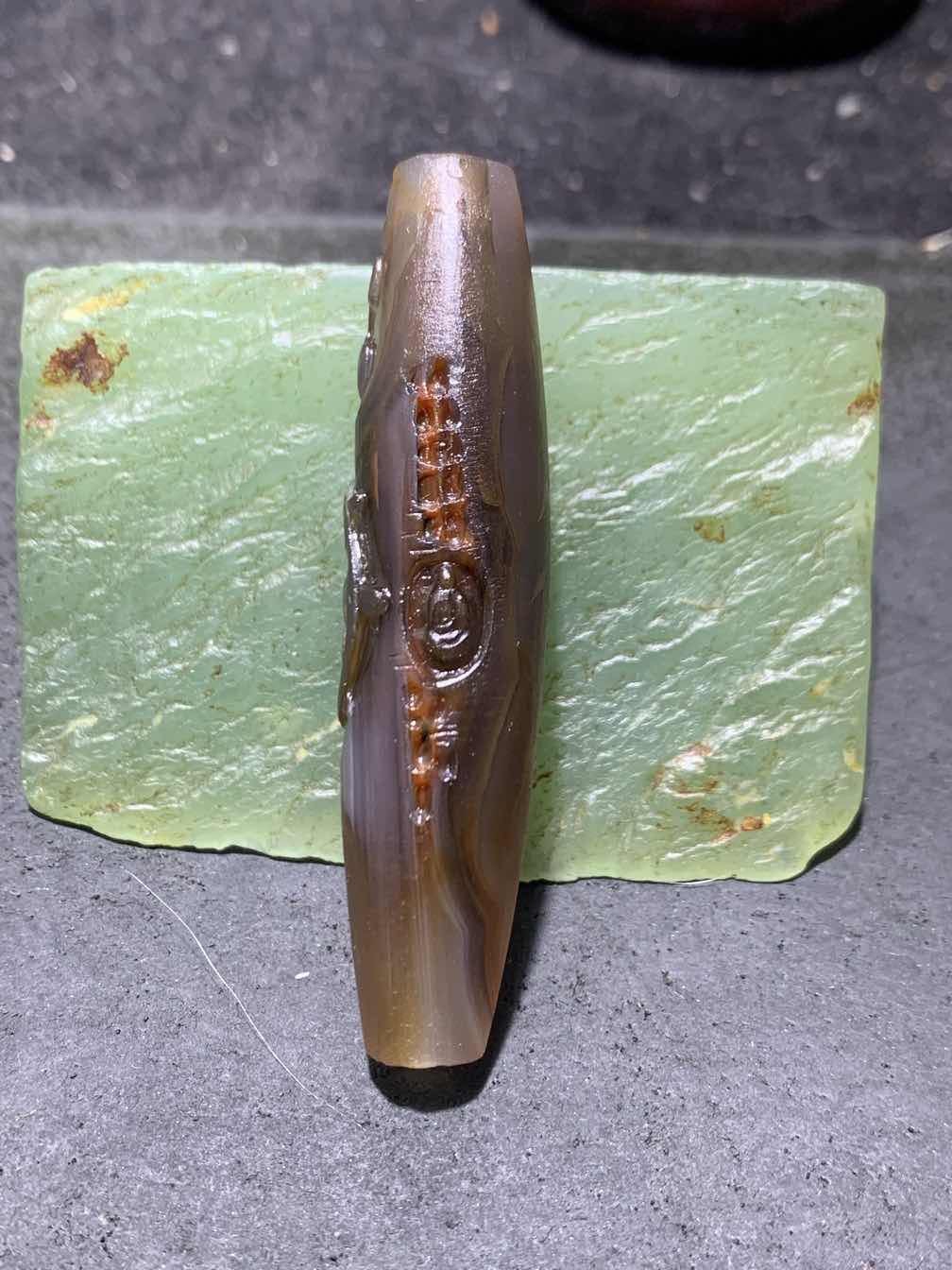 精美亚光高玉化巴西玛瑙手工俏色巧雕无相佛桶珠一个