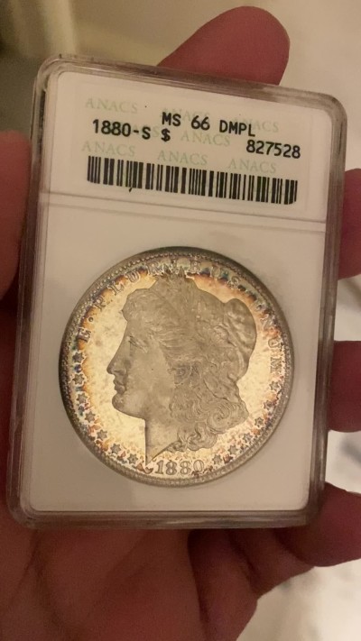 万国钱币拍卖第021期（龙年首拍） ANACS MS66DMPL 1880年美国摩根女神银元1美元 极致环彩+深度镜面 ANACS老盒难得