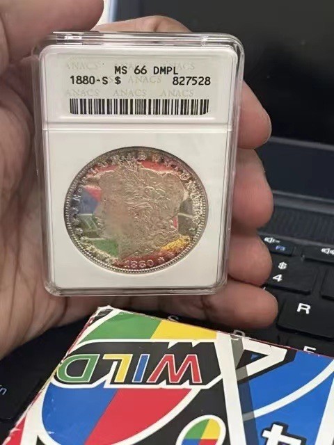 万国钱币拍卖第021期（龙年首拍） ANACS MS66DMPL 1880年美国摩根女神银元1美元 极致环彩+深度镜面 ANACS老盒难得