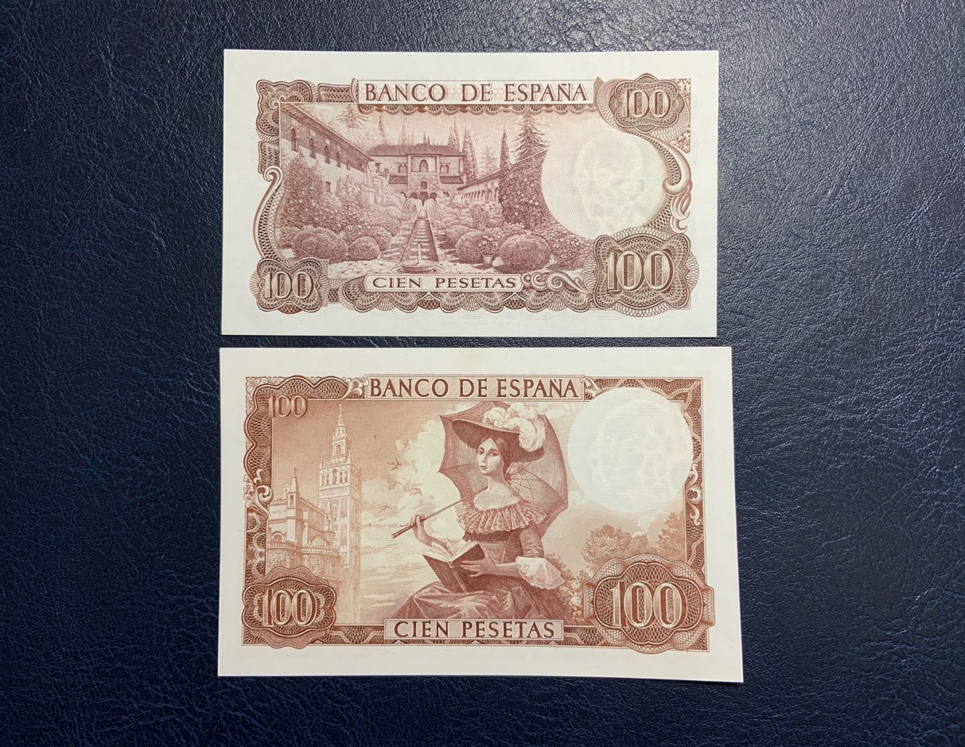 收藏联盟Quantum Auction 第326期拍卖  西班牙1973年和1965年100比塞塔 品相为UNC 其中一张边缘有个轻微黄斑