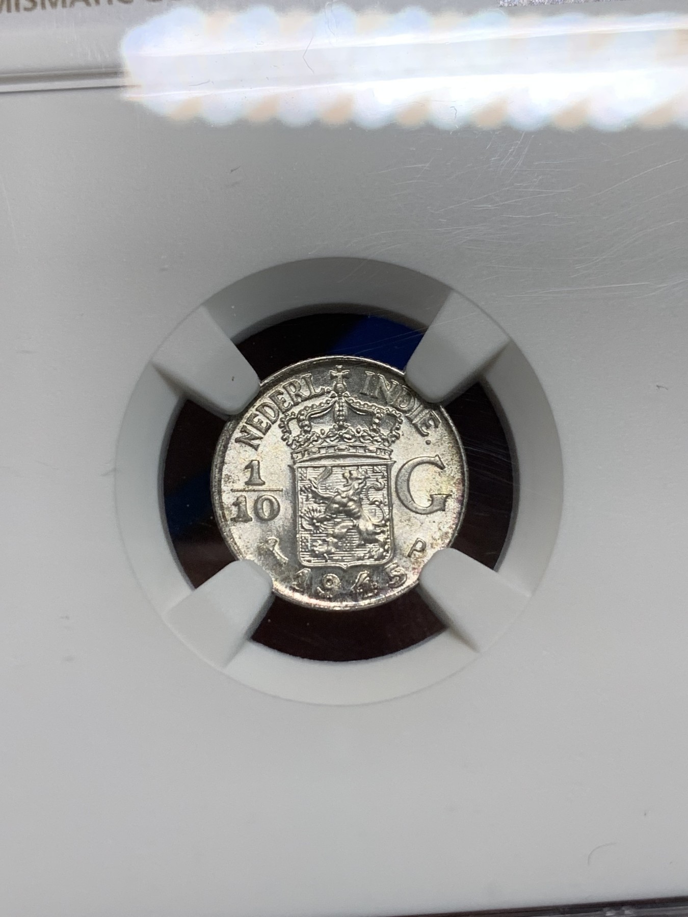 《竞宝斋》第242场-周日，周一 新年开场 (全场包邮) NGC MS66 荷属东印度群岛（今印尼）1945年1/10盾银币 高等级分数