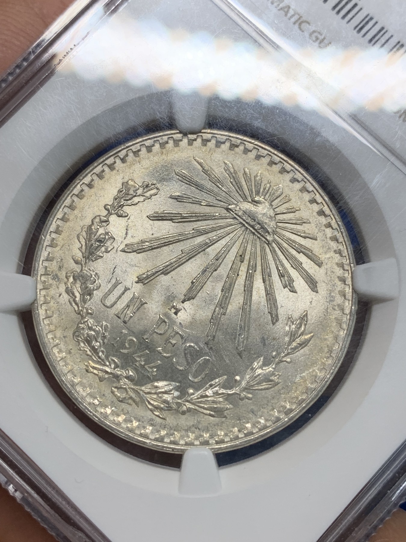 《竞宝斋》第242场-周日，周一 新年开场 (全场包邮) NGC-MS65 墨西哥1944年1比索银币 小鹰洋 高性价比 人手一个